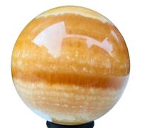 1 boule de cristal sphérique en calcite jaune et quartz orange de 400 à 450 g