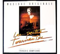 1 Disque Vinyle LP 33 Tours - Milan RC.270 - Les Portes Tournantes - Musique : Francois Dompierre : Adieu Val d'amour, Sur le Quai, Just take the train babe, You don't kill a Piano Player, La Fugue, Les Portes Tournantes.