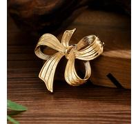 1 pièce Broche minimaliste en or 3D en forme de nœud, accessoire élégant pour les vacances pour femmes. Disponible en nœud de ruban incurvé, incrustation de perle en forme de feuille d'érable, nœud de