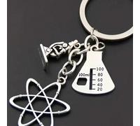 1 pièce Porte-clés en métal thème scientifique avec accessoires chimiques, pendentifs atome et bécher, convient aux professeurs de chimie et aux étudiants, peut être utilisé comme décoration de voitur