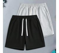 1 pièce Short décontracté noir, interprétant une attitude décontractée avec un design minimaliste. Le tissu en polyester offre une douceur toute la journée, que vous soyez dans la rue par temps frais