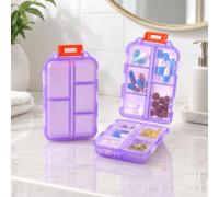 1 pilulier de voyage pour 7 jours, étui compact à vitamines, violet | Coque translucide, couvercles transparents individuels et boucle de transport rouge, design plié avec dix sections