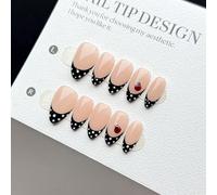 10 pièces de faux ongles courts en forme d'amande à porter, style et populaire. Motifs peints à la main mignons de coccinelle, pois blancs peints à la main, style français noir avec base nude. Produit
