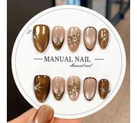 100% Faux ongles courts en amande faits à la main, peints à la main en or rose avec œil de chat, éclat doré et accents de strass. Ongles brillants à presser pour un port quotidien, les rendez-vous et