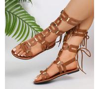 2026 Nouvelles sandales romaines d'été pour femmes, style chic décontracté, à bout rond, design à lacets à l'ouverture, avec bride élastique enveloppée et rivets ajourés, confortables et plates EUR36,