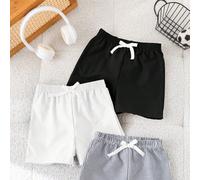 3 pièces/Set Jeune garçon Achetez-en deux, obtenez-en un gratuitement Ensemble de trois shorts décontractés sport college rétro rayés et de couleur unie. Pack multi-économique convenant aux vêtements