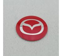 4 Pièce Autocollants Cache Moyeu pour Mazda II / 2 (Typ DY AB BJ 2014) 56.5mm, Autocollant avec Emblème Centre pour Passionnés d'Auto & Utilisation Quotidienne