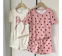 4 pièces Ensemble de pyjamas ajustés pour grandes filles avec imprimé cœur rose et motif à pois beige avec nœud, hauts à manches courtes col rond et shorts en tricot côtelé doux, vêtements d'intérieur