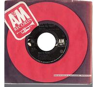 45vinylrecord Four Strong Winds/Just To Satisfy You (7"/45 rpm)