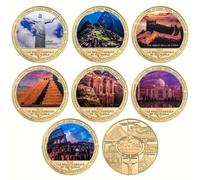 7 pièces de Collection commémoratives représentant Les 7 Nouvelles Merveilles du Monde, avec des étuis de Protection individuels, et Sept Supports de présentation.