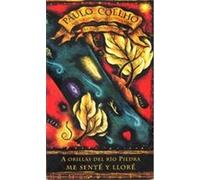A Orillas Del Rio Piedra Me Sente Y Llore / By the River Piedra, I Sat Down and Wept Paulo Coelho (Auteur)