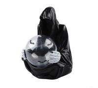 Accessoire de bureau distinctif avec orbe lumineux et éléments flottants conçus pour les amateurs d'art gothique mystérieux