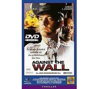 Against the wall