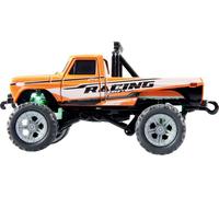Amewi orange brushed 1:64 Auto RC électrique Monstertruck propulsion arrière prêt à fonctionner (RtR) 2,4 GHz avec effet lumineux, avec accu et câble de charge