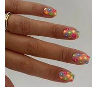 Appuyez sur la fausse colle à broder sur les ongles en cas de faux défauts d'acrylique
