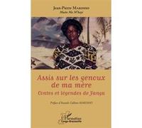 Assis sur les genoux de ma mère