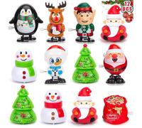Assortiment de 12 jouets de Noël à remonter : Père Noël, bonhomme de neige, renne, pingouin et lutin. Idéal pour les fêtes, les