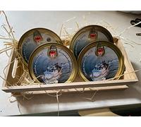 Assortiment de boîtes de dos de sardines avec confiture de poivron rouge, avec truffe, fumées et marinées