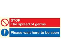 Autocollant photoluminescent en vinyle avec inscription « Stop germs Please wait here to be seen ».