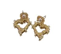 avec un tempérament européen et américain, des boucles d’oreilles haut de gamme pour le sens de l’amour, un design exagéré et de niche,