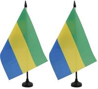 AZ FLAG - Drapeau De Table Gabon 21x14 cm - Petit Drapeau Gabonais De Bureau 100% Polyester Avec Hampe De 25cm Et Socle En Plastique Noir (Lot de 2)