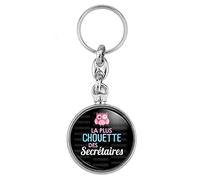 BADGMANIA Porte Clés Métal 2 faces La plus chouette des Secrétaires - Chouette Rose Fond Noir - Idée Cadeau Femme Humour Métier Logo 33mm