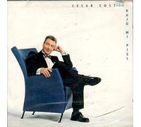 Bajo Mi Piel by Cesar Costa