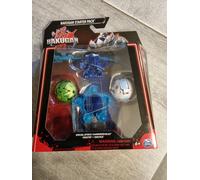 BAKUGAN 3.0 - STARTER PACK - 2 Billes Bakugan, 1 Bille Bakugan Special Attack, 1 Anneau de Combat, 1 Carte Lanceur et 9 Cartes - Collection Bakugan Jouet - Jouet Enfant 6 Ans Et + - Modèle Aléatoire
