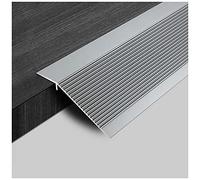 Bande de transition inégale au sol pour porte, réduit les différences de hauteur, idéale pour un mouvement fluide d'une pièce à l'autre