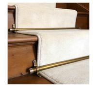 Barres de fixation réglables pour tapis d'escalier, avec supports polis et fixations sécurisées. Longueur personnalisable pour escaliers fixes. Installation facile. Idéal pour une utilisatio