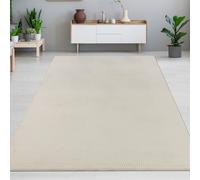 Beau tapis chaud avec d'élégants motifs linéaires en creme