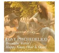 Beautiful World/Happy X'mas [W [Import allemand]