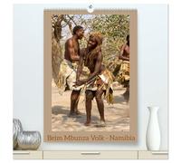 Beim Mbunza Volk - Namibia (hochwertiger Premium Wandkalender 2026 DIN A2 hoch), Kunstdruck in Hochglanz: Führung durch ein Museumsdorf mit traditioneller Lebensweise.