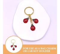 BESTYASH Porte-Clés en Alliage Métal Léger Pendentif Créatif Motif Libellule à Sept Points Accessoire Paquet et Porte-Clés Voiture Décor Original pour Femmes Présent Polyvalent