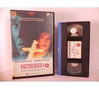 Betrayed [VHS] [Import anglais]
