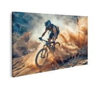 bilderfelix Tableau sur toile Un cycliste professionnel navigue sur un VTT Enduro sur un chemin poussiéreux et soulève la poussière - Toile 100x57 cm