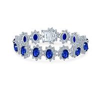 Bling Jewelry Bracelet de déclaration de mode de tennis avec grand halo de couronne nuptiale, ovale bleu royal CZ pour femmes, mariage, bal, saphir simulé, zircon cubique, laiton plaqué argent.