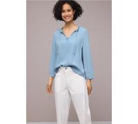 Blouse à manches 3/4 avec col fendu dans un look denim