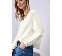 Blouse avec col en V et broderie