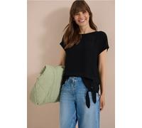 Blouse avec col rond et détail de nœuds
