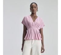 Blouse décontractée en lin doux et confortable pour femmes, col V, manches courtes, taille froncée. Vêtement de croisière à la mode, avec une touche de luxe minimaliste du Moyen-Orient. Polyvalente po