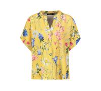 Blouse légère avec motif naturel et patte de boutonnage à manches courtes