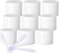 Boîte de maquillage. Lot de 24 vides épais brillants avec couvercle à vis, doublure intérieure, flacons d'échantillons de voyage + 24 spatules.(120ml)