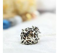 Bola cage - bille bronze - céleste