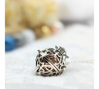 Bola cage - bille rose - céleste