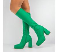 Bottes longues à talons blocs audacieux Faites une entrée mémorable avec ces bottes d'un vert éclatant. Leur teinte éclatante et leur semelle plateforme audacieuse créent un effet visuel puissant qui