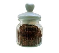 Boules de cacao dans 70 % de chocolat noir du Mexique dans une bouteille en verre décorative