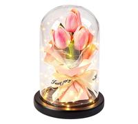 Bouquet de fleurs conservé dans une cloche en verre comme un bouquet
