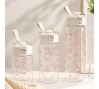 Bouteille d'eau avec couvercle à ressort imprimé cœur, tasse à boire portable en plastique avec sangle de transport, couvercle à ressort anti-fuite à un seul toucher, plusieurs capacités 500/700/1000m