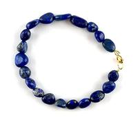 Bracelet bleu avec perles naturelles de lapis lazuli (non teinté) en forme de petits galets irréguliers. Fermoir anneau ressort en argent 925 ou en laiton plaqué or. (DORE, 18)